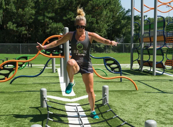 woman exercising in playground